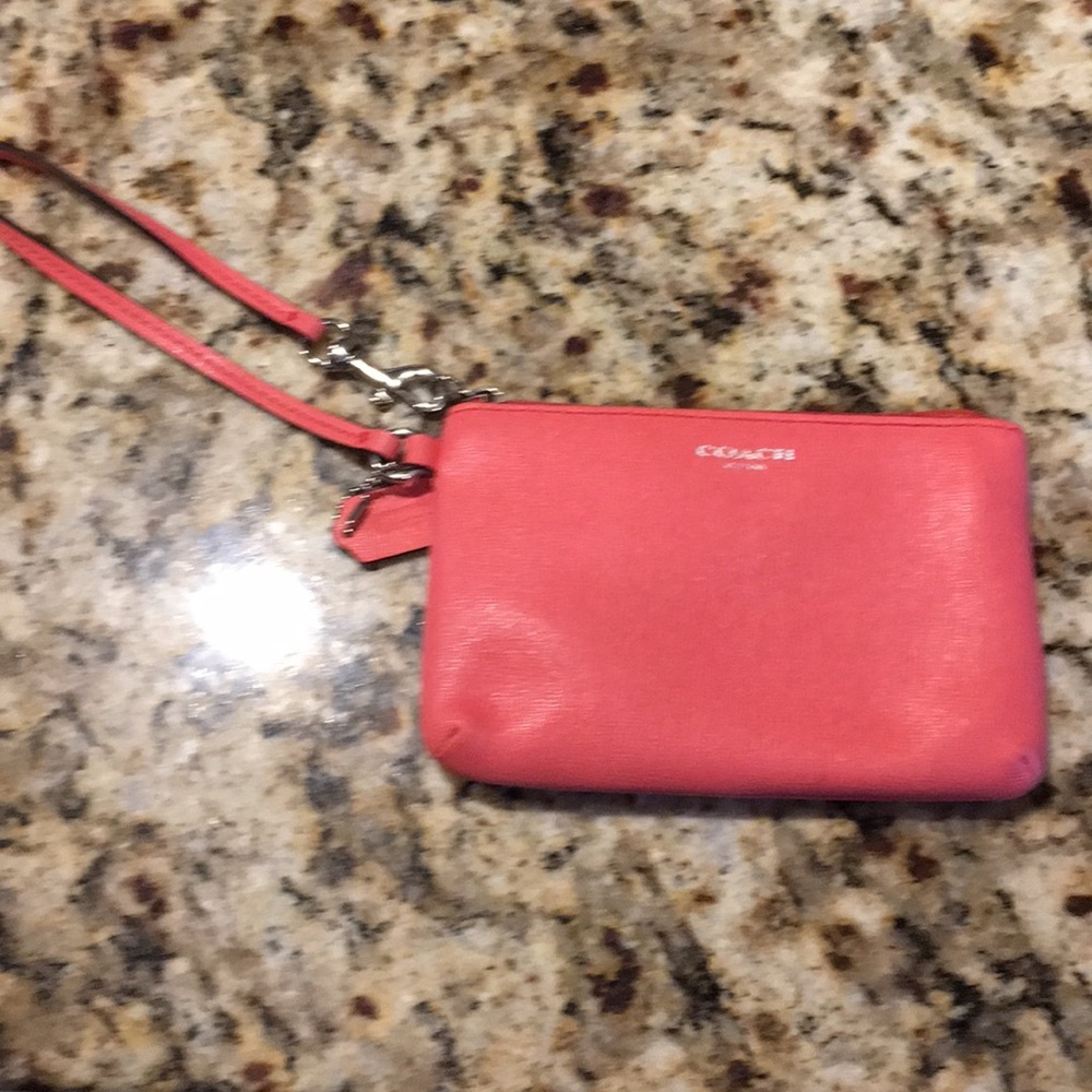 Coach saffiano wristlet in coral